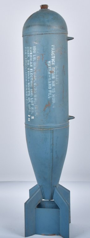 U.S. NAVY PRACTICE BOMB, INERT: Measures 42" tall and is meant to hold sand and be used for bombing practice. A very nice inert display item. Excellent