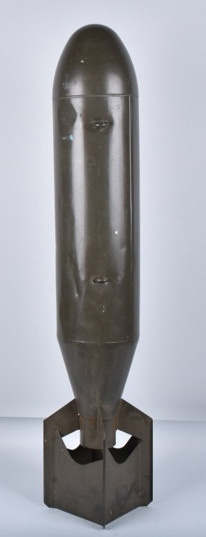 LARGE PRACTICE BOMB, INERT: Measures 48" tall and is used for practice bombing. Has been over painted. A very nice inert display item. Very Good