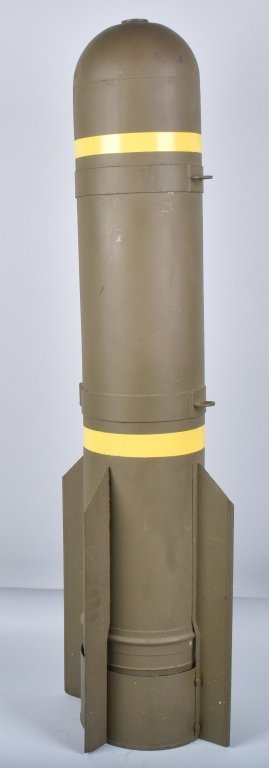 LARGE PRACTICE BOMB, INERT: Measures 47" tall and is used for practice bombing. Has been over painted. A very nice inert display item. Very Good