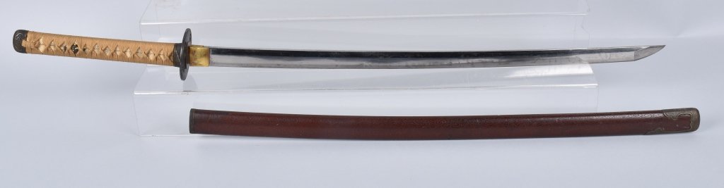 JAPANESE SWORD / KATANA , SIGNED TANG: Katana is 41" overall with a 28 1/2" blade. Tang is maker marked, dates from the 1800's blade has a flaw 13 5/8" from Tsuba. Has Samuri mounts. The Katana has a very large Kissaki,and the Sayo is very