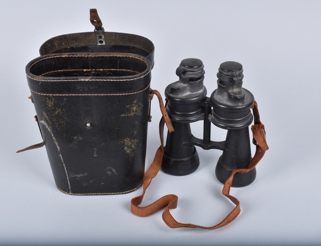 NAZI GERMANY 1944 BINOCULARS with Case: Great pair of Nazi binoculars with the original case. Binncoulars are excellent, case shows wear and carrying strap is broken. Nice markings on lid of case. Excellent