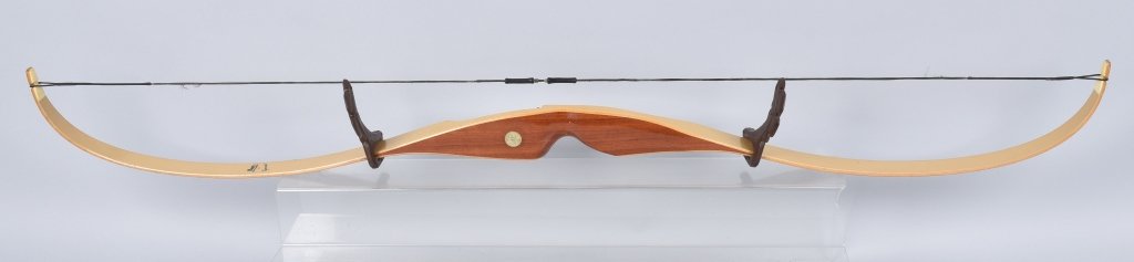 BEAR ARCHERY BOW, KN22352 AMO-58", VINTAGE: Great looking quality bow made by Bear Grayling Michigan. Has US patent dates and is patented in Canada in 1954. Excellent