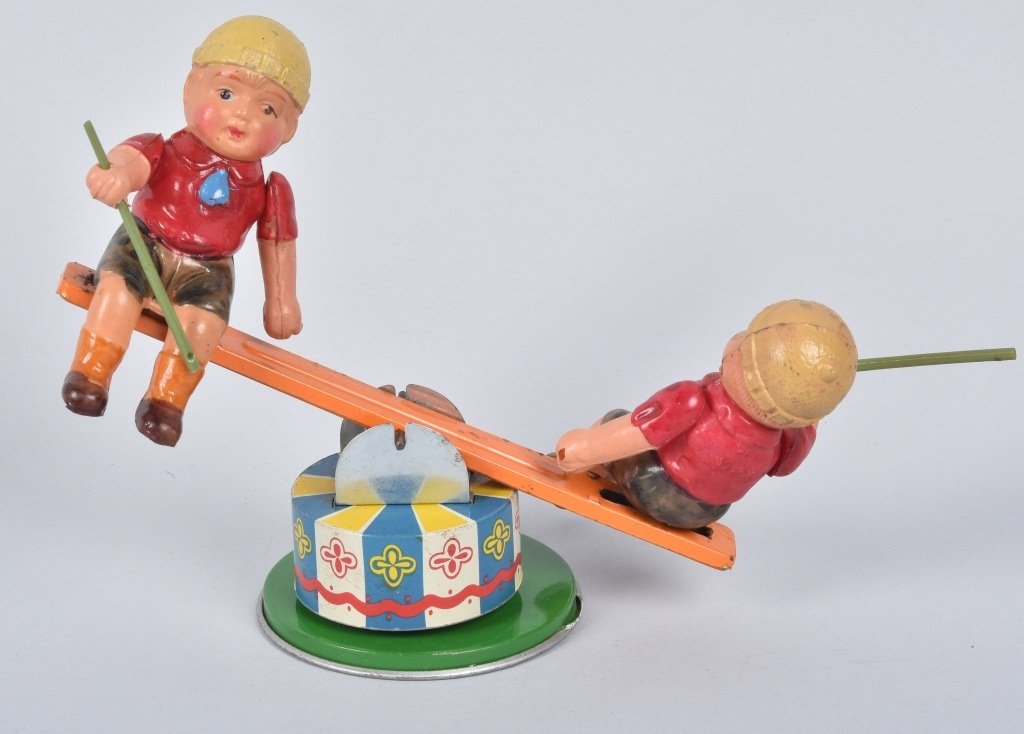 JAPAN Tin & Celluloid Windup BOYS ON SEE-SAW (1 of 5)