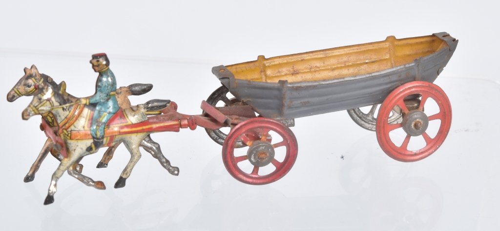GERMAN PENNY TOY 2 HORSE w/ RIDER DRAWN WAGON: Unusual German Penny Toy with nicely detailed horses one with rider pulling an boat shaped wagon. Original with nice colors 5" Excellent