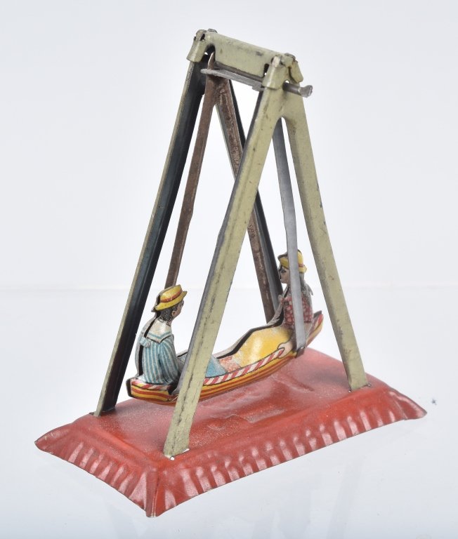 GERMAN PENNY TOY BOY & GIRL ON SWING (1 of 5)