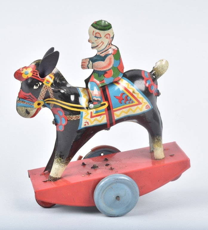 ENGLAND Tin Windup CLOWN ON DONKEY: Unusual tin windup. Great colors. Works. 6" Excellent