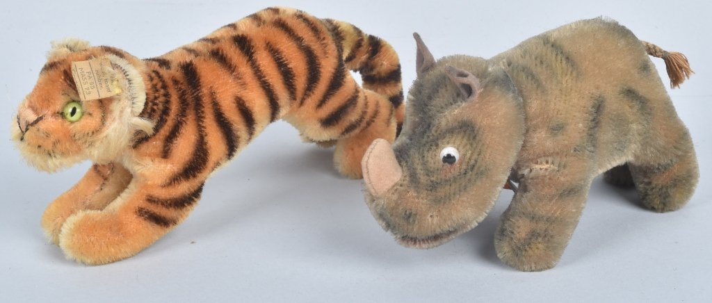 2- Eary STEIFF NOSY RHINO & YOUNG TIGER: Nice pair of early Steiff. Includes Nosy Rhino 5" with Tag. Plus 0900/10 Young Tiger Running 6" with Button and Flag. Very Good-Excellent