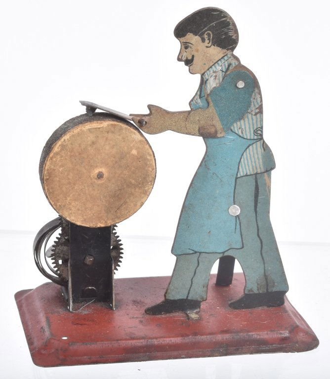 GERMAN Tin Windup MAN AT GRINDING WHEEL (1 of 2)
