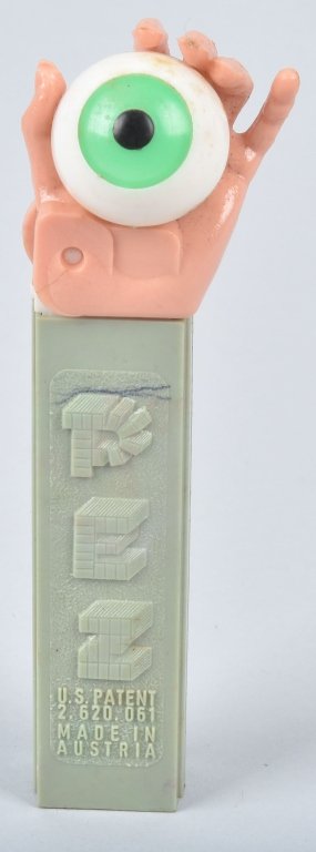 VINTAGE PSYCHEDELIC EYE NO FEET PEZ CONTAINER (1 of 2)