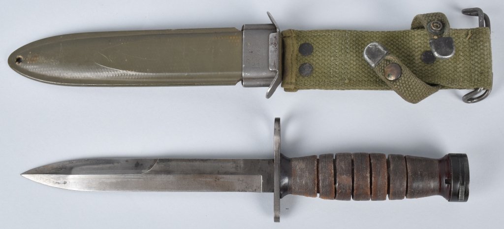 WWII U.S. .30 CALIBER CARBINE BAYONET, IMPERIAL: 11 1/2" overall with 6 1/2" un-sharpened blade, Guard marked US M4 Imperial, scabbard marked US M8A1, Grip shows wear, scabbard nice. Very Good plus