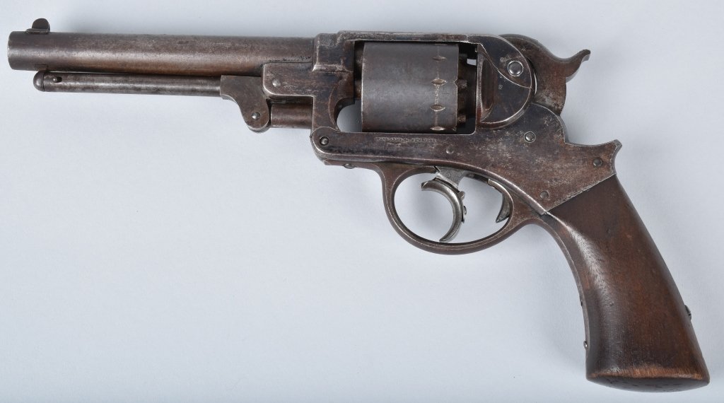 CIVIL WAR STARR .44 DA REVOLVER: SN 15121, Nice original gun with traces of original blue finish, 6" barrel with nice bore, double action works well, crisp markings, excellent walnut grips with military cartouche on each side. Very G