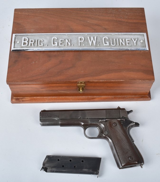 M1911 REMINGTON RAND .45 PISTOL, ID'd GEN. GUINEY: SN 2057909, Nice pistol which belonged to Brig General P.W. Guiney and is housed in a walnut box with name plate on top. Mechanics are very good. Gun has a very good bore and much of the original fini