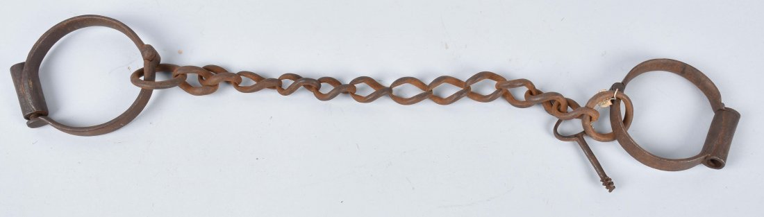 ANTIQUE LEG IRONS with KEY: Measures 21 1/2\" long and are well made. Includes original key. No markings. Very Good