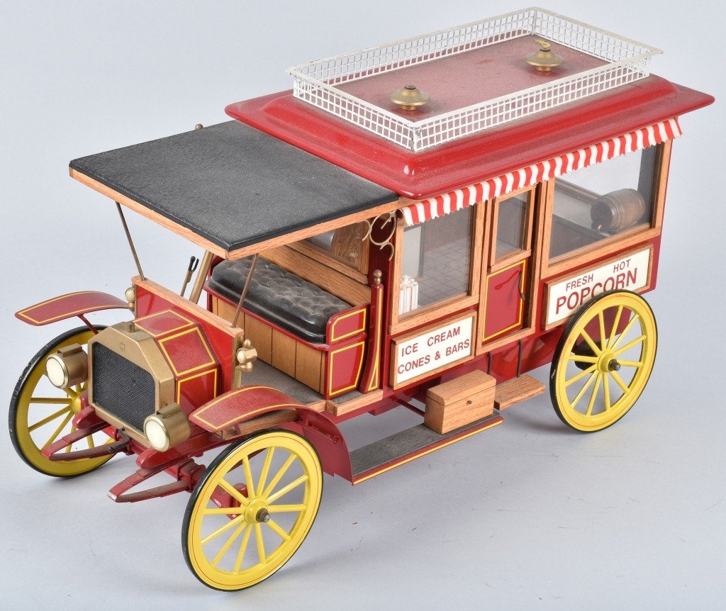 HANDMADE ANTIQUE POPCORN VEHICLE: Very limited edition metal Popcorn Vehicle made by Kenneth and Edward Kovch. Great details throughout. 20" Excellent