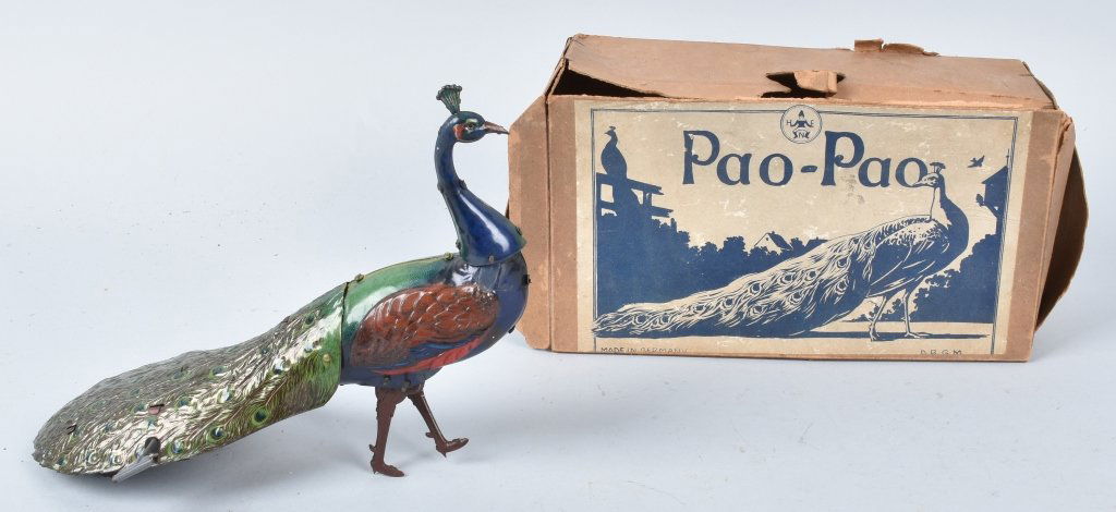 HANS EBERL Tin Windup PAO PAO PEACOCK w/ BOX: A wonderful early German tin windup Peacock. The colors on this toy are striking. The windup works as well as the bellows. Comes with exceeding rare original box. 9" Near Mint