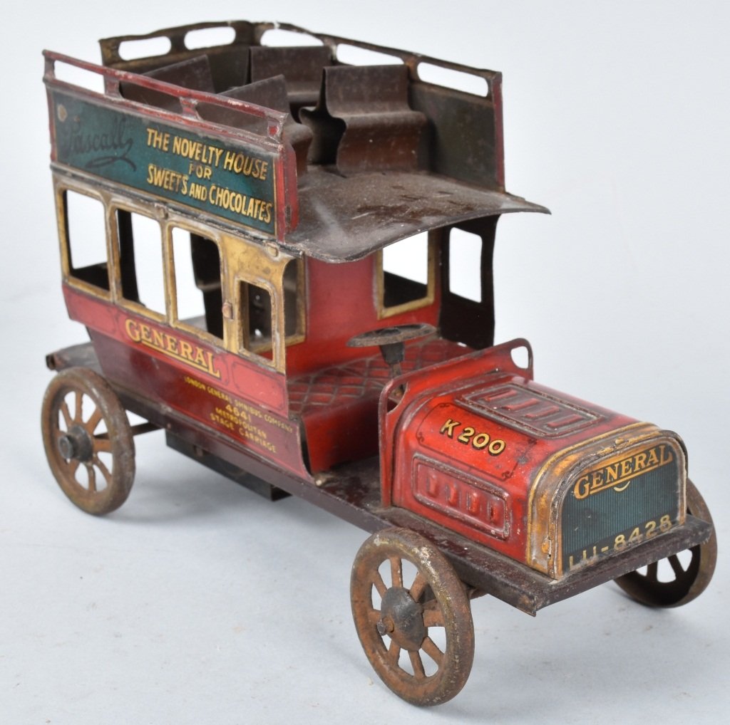 BING Tin Windup DOUBLE DECKER BUS: Scarce tin windup Double Decker Bus made in Germany. Nice early Bing toy. Great colors and graphics. Missing rear steps and mech needs adjustment. A little work will make this a wonderful toy. 8" Very