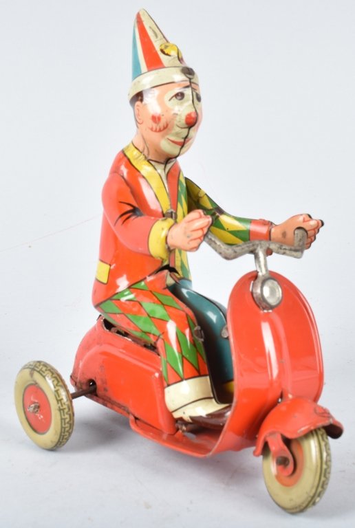 GERMAN Tin Windup CLOWN ON SCOOTER (1 of 4)