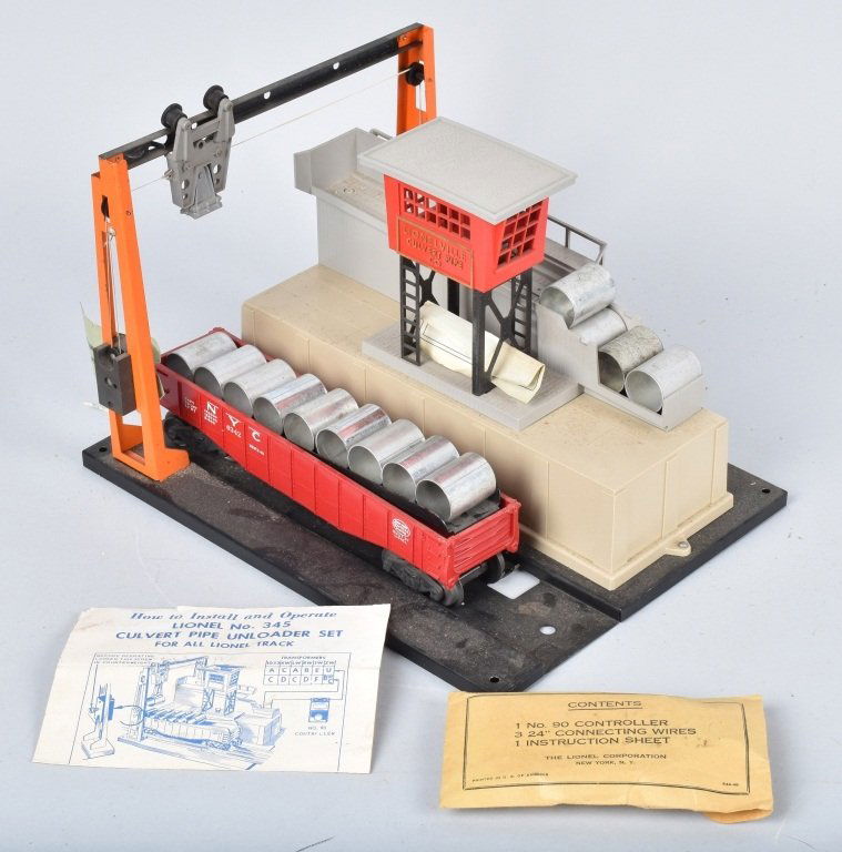 LIONEL # 345 CULVERT PIPE UNLOADER SET nEAR mINT: Lionel # 345 Culvert Pipe unloader Set in what appears to be new condition. No box with it but it still has the tags attached as it did from the factory. Includes 6342 New York Central Gondola and 13