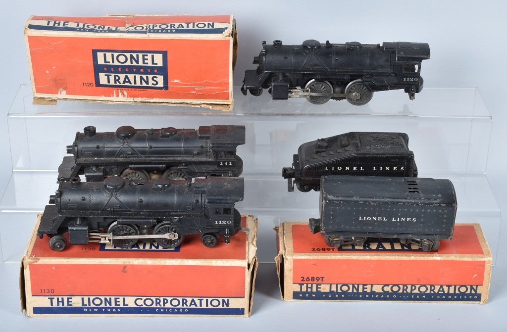 LIONEL LOCOMOTIVE and TENDER LOT: Lot includes boxed No. 1120 and No. 1130 locomotives, a boxed No. 2689T tender, and a No. 242 locomotive and tender. Untested. Very Good-Excellent