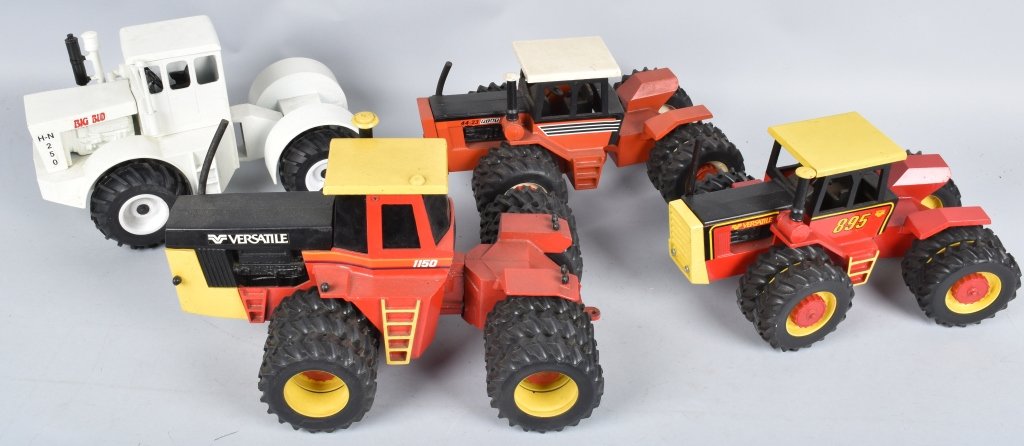 LOT OF 4 1/10TH SCALE TRACTORS VERSATILE FIAT: Lot of 4 large 1/10th scale Versatile, Fiat and Big Bud Tractors. Very detailed no boxes very nice condition