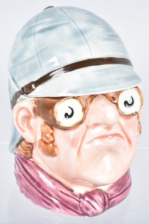 MAJOLICA RACE CAR DRIVER TOBACCO JAR: Excellent original Majolica Tobacco Jar with skinny face Race Car Driver. Excellent colors. No issues. 6" Excellent