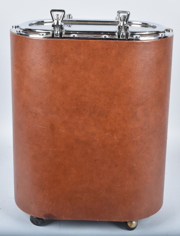 Vintage GUCCI PORTHOLE WINE COOLER: Outstanding vintage Gucci Porthole Wine Cooler. Leather bound cooler with nickel and glass porthole top. Top has screw down style latches. Cooler sits on wheels. Still has removable insert. Made in It