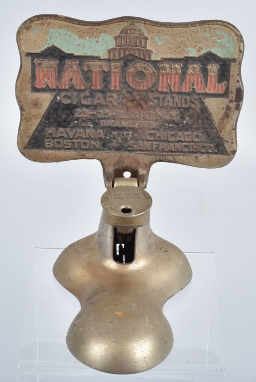 NATIONAL CIGAR STANDS ADVERTISING CIGAR CUTTER: Excellent 1902 Burnhoff Mfg. cast iron National advertising cigar cutter. All original and complete. No breaks. Has patina throughout. 8" Very Good