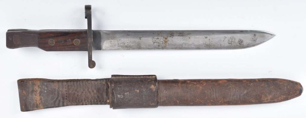 US Marked CANADIAN ROSS BAYONET & SCABBARD: Unusual Canadian Ross Bayonet that has limited use by the US in WW1. Marked Ross Rifle Co Quebec 1907. Leather scabbard marked US. Has wear and patina. Very Good