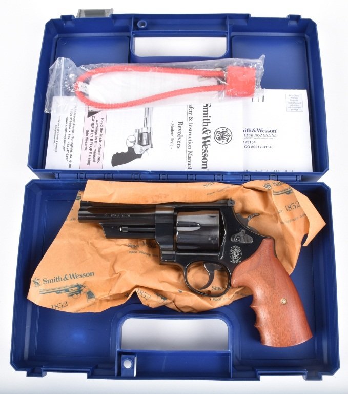 SMITH & WESSON M57-5, .41MAGNUM, REVOLVER, BOXED: SN CJH2057, 4" barrel with mirror bore, tight action, excellent finish and grips, includes box, paperwork and lock. Near Mint*