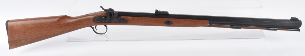 THOMPSON PERCUSSION .50 RENEGADE RIFLE: SN 36033, 27" barrel, well made gun by Thompson Center Arms, nice action, stocks and finish. Minor wear. Excellent