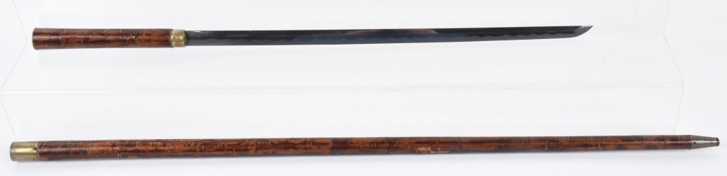 JAPANESE SWORD CANE w/ HANDMADE BLADE Nice Hamon: Wonderful early Japanese Sword Cane. Handmade Blade with very nice Hamon. Not signed. Nice wood sheath with brass and bone accents. Blade measures 17 3/4" 35 3/4" Overall. Excellent