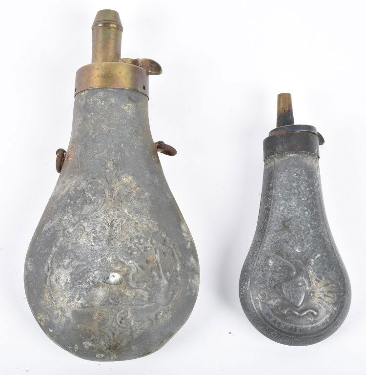 LOT OF 2 ZINC POWDER FLASKS, EAGLE PISTOL FLASK: Largest is 6 1/2", both have wear. Larger flask is missing spring, pistol flask has a dent. Good-Very Good
