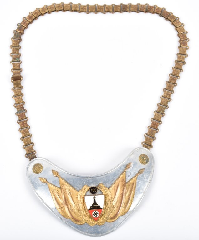 WW2 GERMAN 1937 PATTERN REICHSKRIEGERBUND GORGET: Nickel plated 1937 pattern Reichskriegerbund standard bearer's gorget with enamel decoration. Includes iron cross brass chain. Has light wear, missing part of one hook on back. . Very Good-Excellent