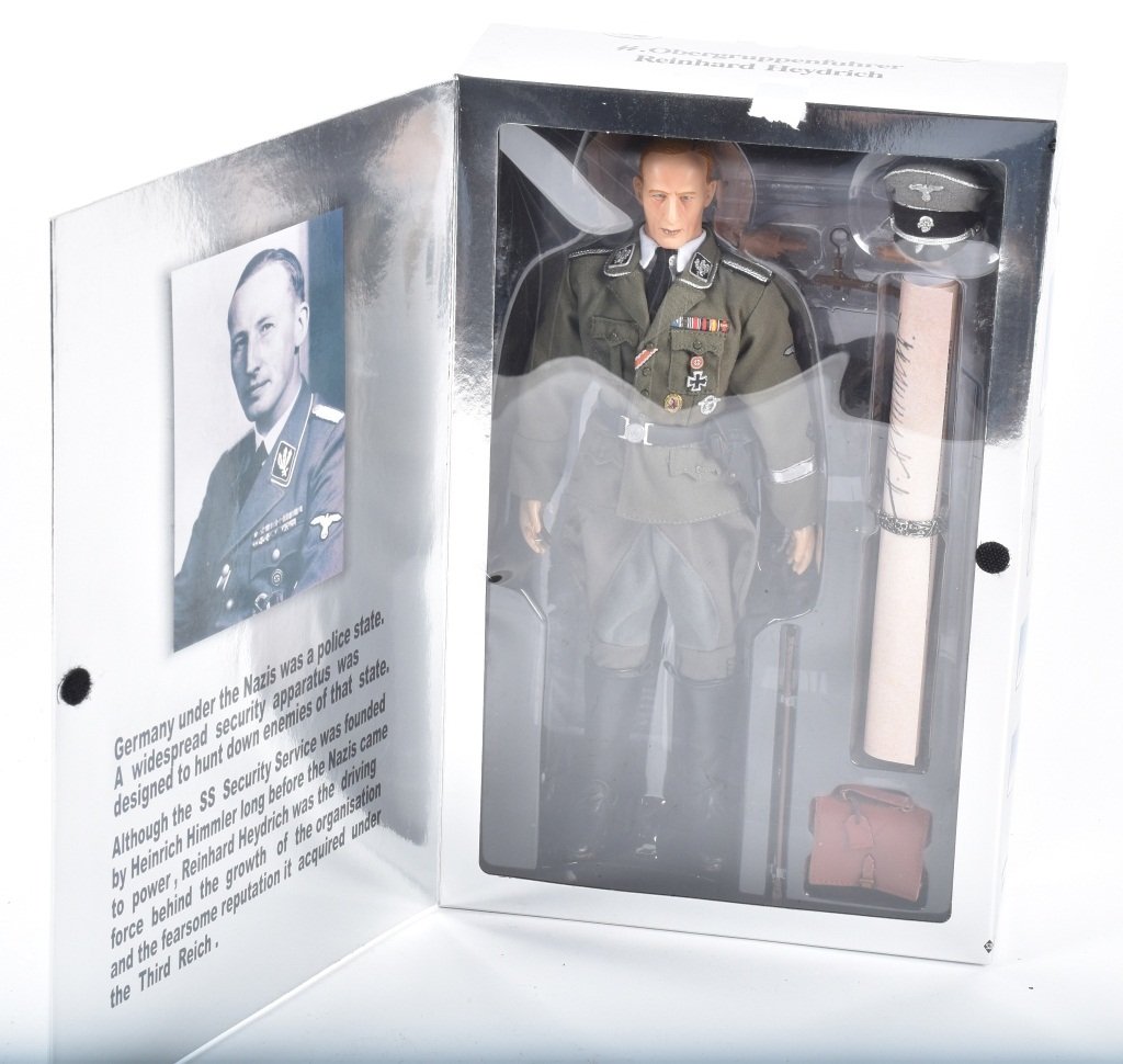 REINHARD HEYDRICH ACTION FIGURE. MIB: Very detailed action figure of one of the most notorious Nazis during WW2. Figure is complete with uniform, coat, hat and other accessories. Very well made. Near Mint