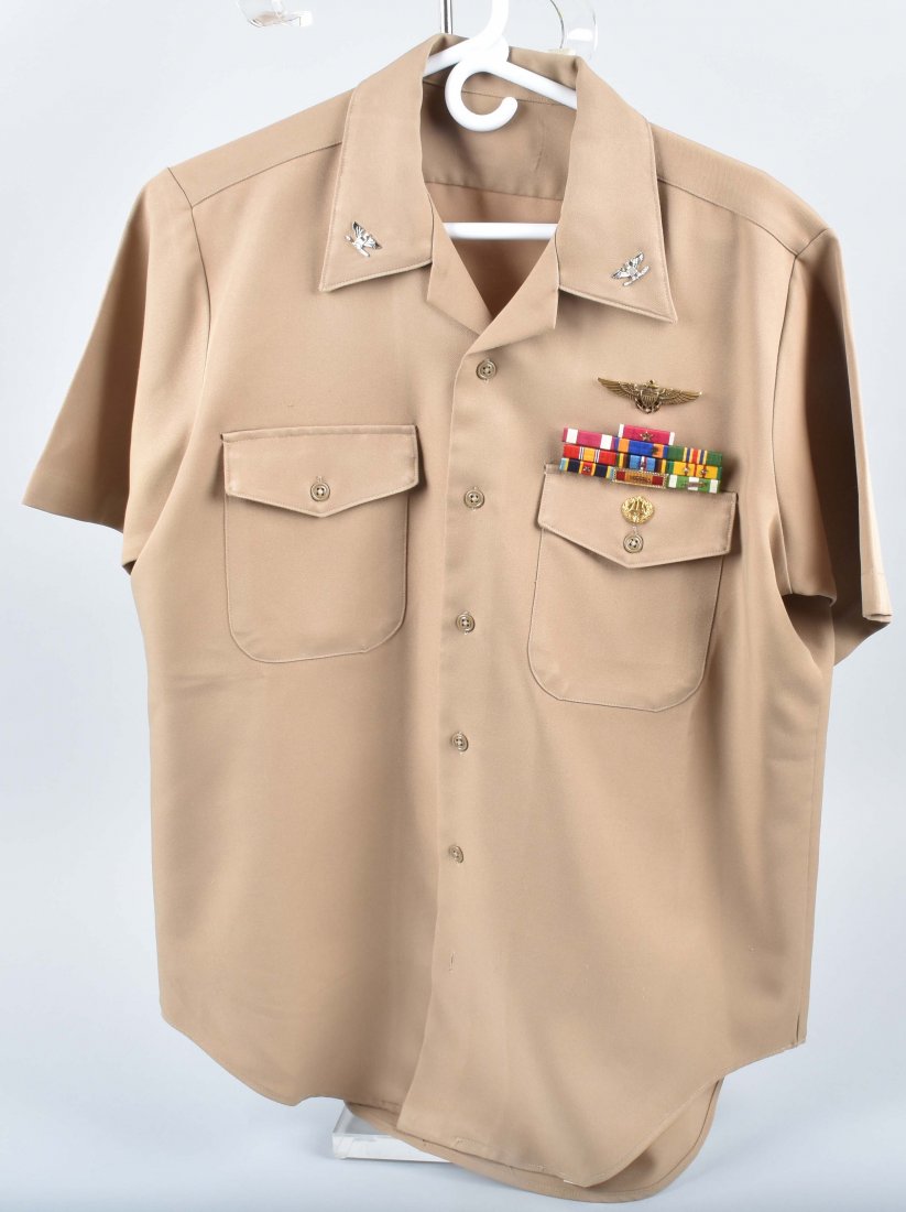 VIETNAM NAVY PILOT, ID'D GROUPING: Great grouping of Captain David R. Riley, A Vietnam Pilot with dress jacket with wings, and service ribbons, along with fatigues and more. About a size 40-42. Excellent