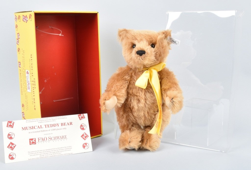 STEIFF FAO SCHWARZ MUSICAL TEDDY NMIB: Steiff FAO Schwarz Musical. He was made from 1993-2000 and is 12 inches made of mohair & is jointed. White & black flag EAN 652080 Ltd Ed 00184/2000 for FAO Schwarz. He is Musical and plays "Come to t