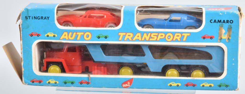 Japan AUTO TRANSPORT w/ CAMARO & CORVETTE w/BOX: Japan Auto Transport with Camaro and Corvette. Great colors. Never played with condition. With Box. 11" Excellent