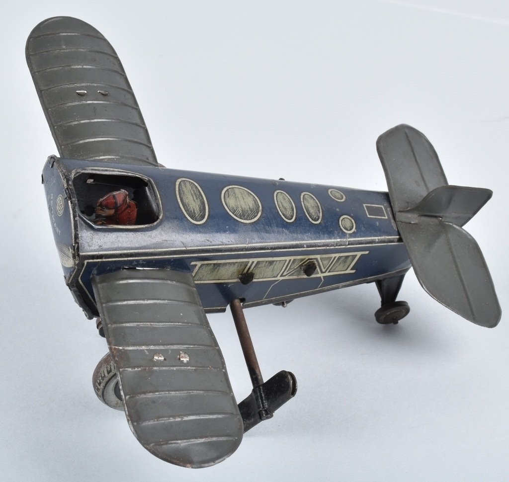 GUNTHERMAN Tin Windup ROLLOVER AIRPLANE (1 of 6)