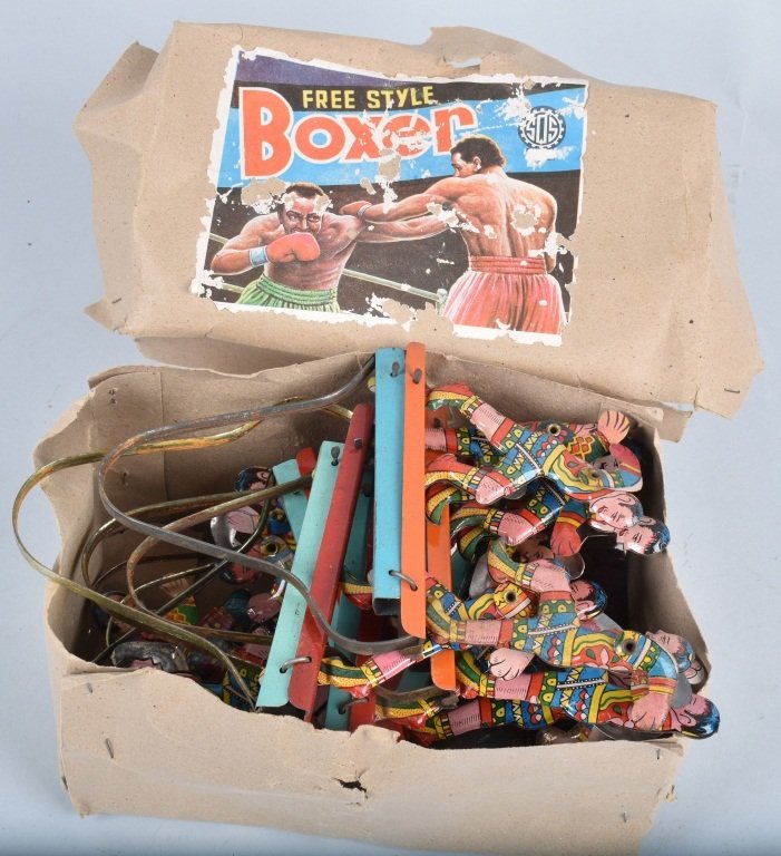 SQS Tin FREE STYLE BOXER Box of 10: Full box of 10 Free Style Boxer tin squeeze toys. Great colors. New Old Stock. With Box. 8" Excellent