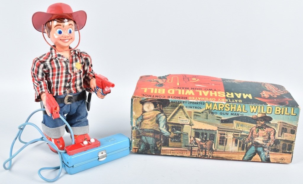 JAPAN Battery Op MARSHAL WILD BILL w/ BOX: All original with hat. One gun is broken. Did not work when tested. With Box. 12" Very Good