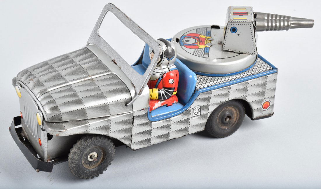 DAIYA Tin Friction LIGHTNING JEEP: Unusual space jeep. Missing part of gun and 3 hub caps. Friction not working. Hard to find space toy. 7" Very Good