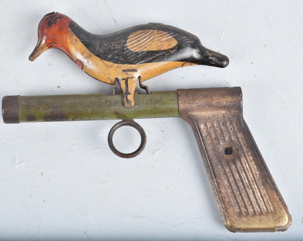 THE WHOOPEE BIRD TIN GUN: Early tin gun with bird. All original and works. 7" Very Good-Excellent