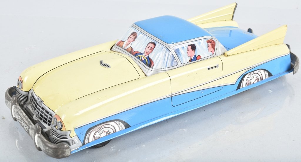 JOUSTRA Tin Friction CAR WITH FINS: Great looking tin friction car made in France. All original and works. 14" Excellent