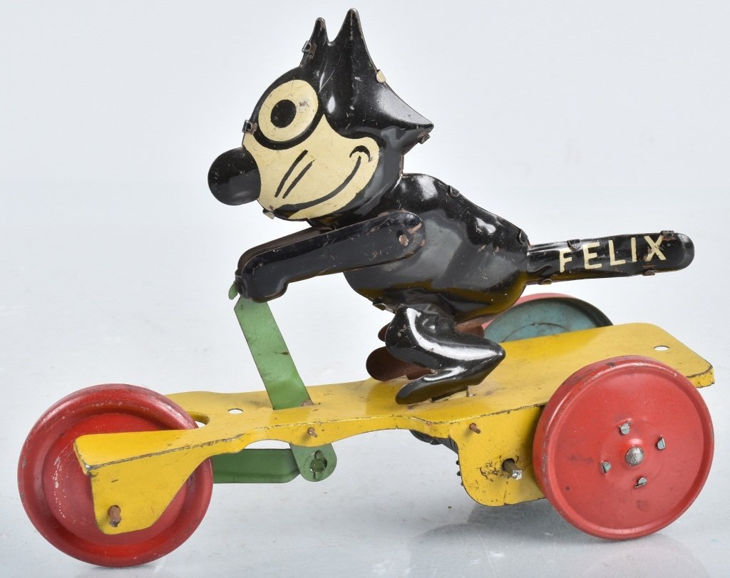 NIFTY Tin Windup FELIX ON SCOOTER (1 of 3)