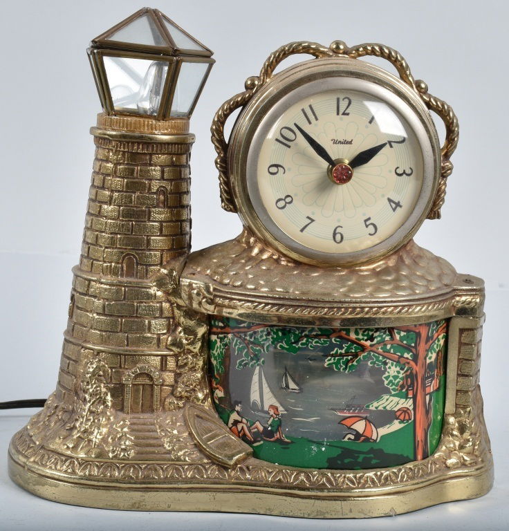 CAST METAL LIGHTHOUSE MOTION LAMP / CLOCK (1 of 4)
