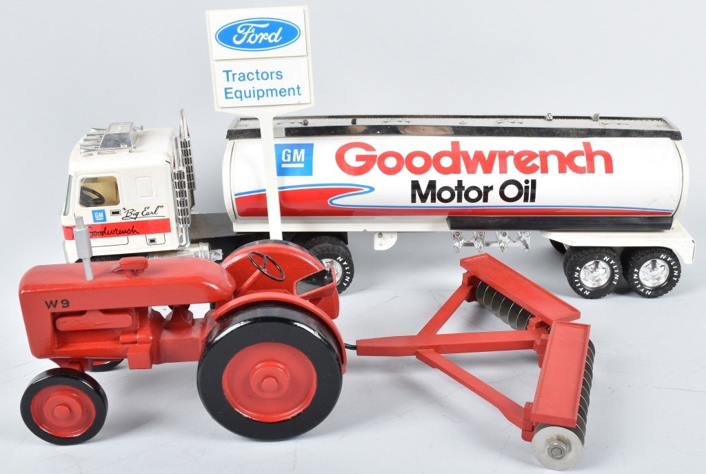 NYLINT GM MR. GOODWRENCH TANKER, & WOOD TRACTOR: Tanker measures 21" long and is excellent with light wear. 8" wood tractor is very well made and is dated 1987 underneath. It includes a disk implement. Excellent