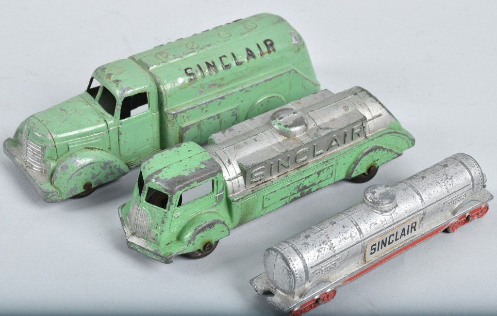 Lot of 4- SINCLAIR TOY TRUCKS & DINO (1 of 7)