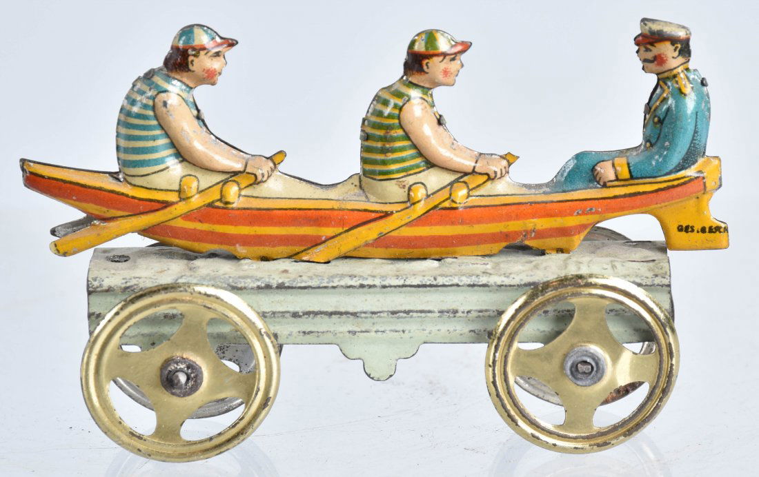 GERMAN PENNY TOY MEN IN ROW BOAT (1 of 3)