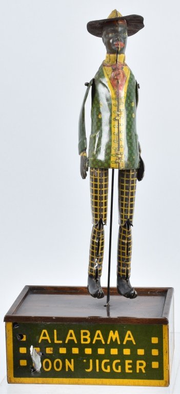 STRAUSS Tin Windup TOMBO ALABAMA COON JIGGER: All original with great colors. Has original arms that have been retabbed. Works. 10 1/2" Excellent