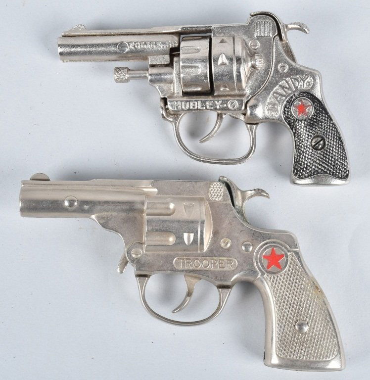 2-HUBLEY CAP GUNS, DANDY and TROOPER: The 5 1/2" Dandy is cast iron, and the 6" Trooper is diecast. Both worked when tested. Excellent-Near Mint